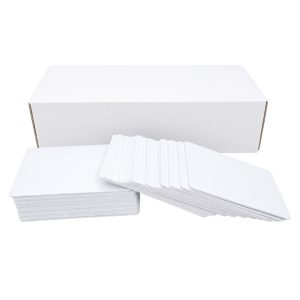 Blank white IC cards shown with a shipping carton, a stacked pile and a fanned card