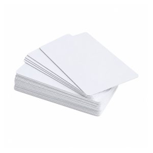 Thick slanted deck of blank white IC cards showing layered edges