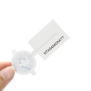 Hand holding NTAG 424 DNA TT anti-counterfeit NFC label