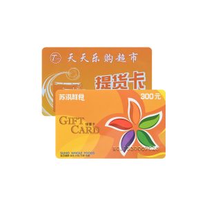 Printed supermarket stored value gift voucher card with floral artwork and foil numbering