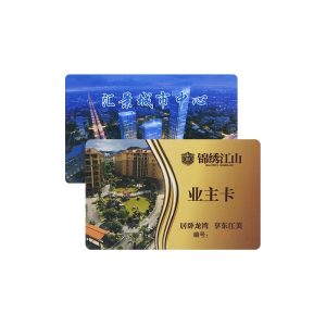 Printed residential community owner card in gold with embossed numbering