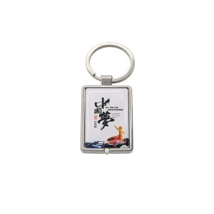 White metal frame epoxy key fob with Chinese calligraphy design